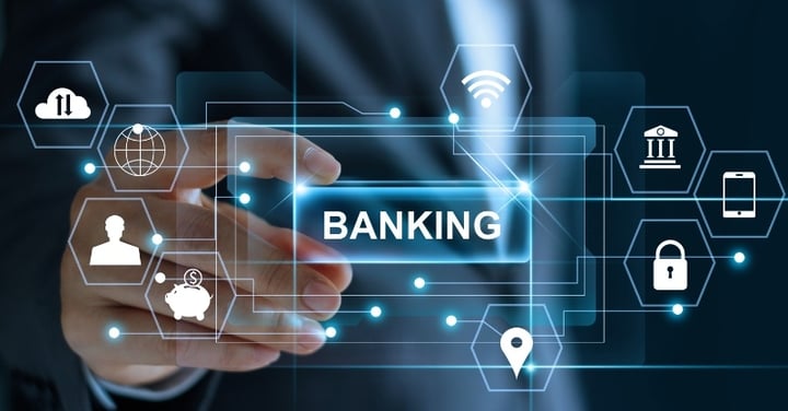 Hand using a digital banking interface