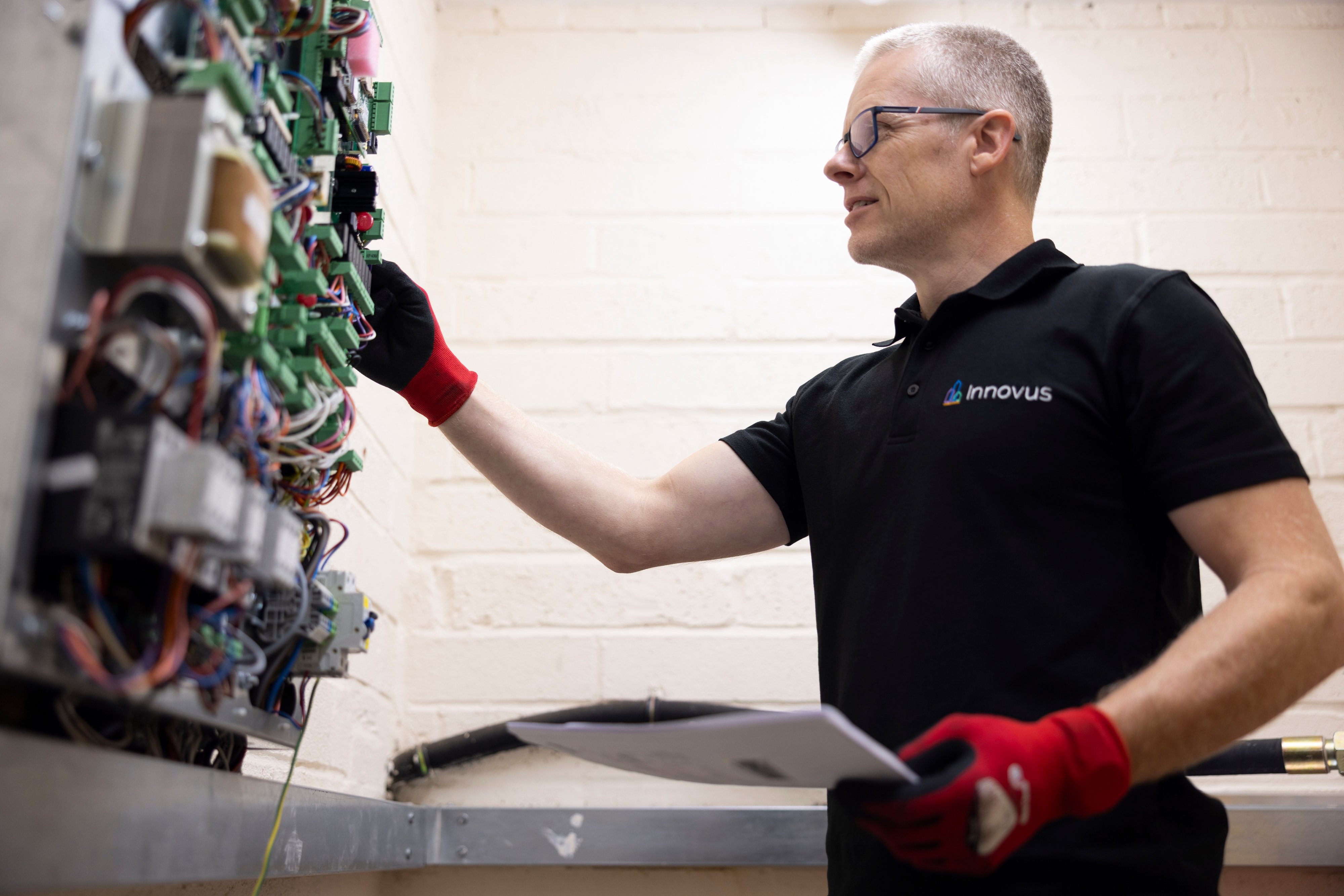 electrician working on control panel