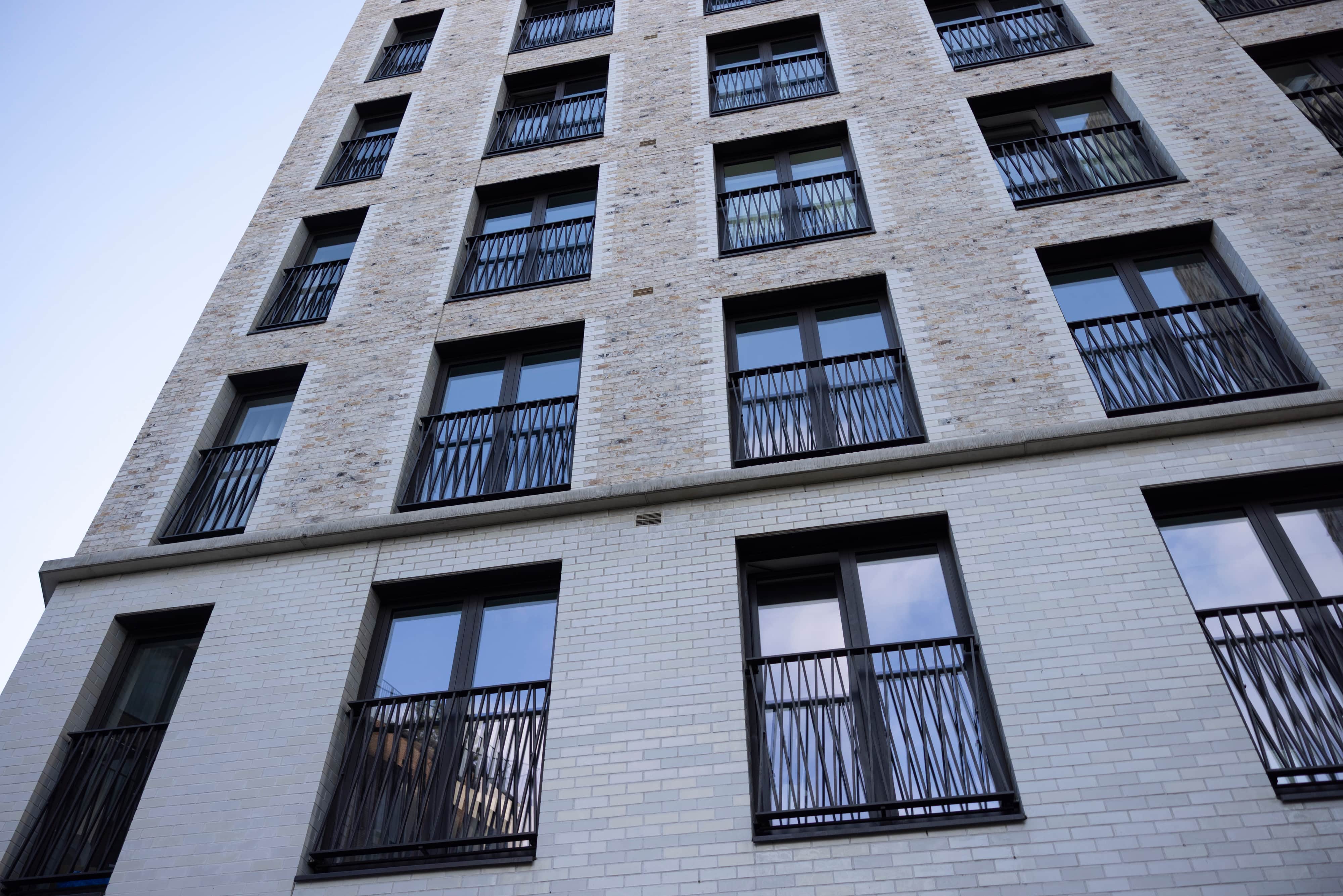 Looking up at residential building